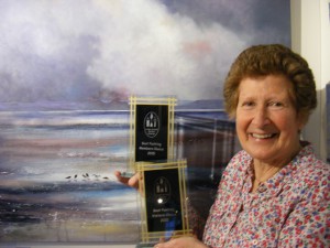 Pauline Collins with her awardsl.res